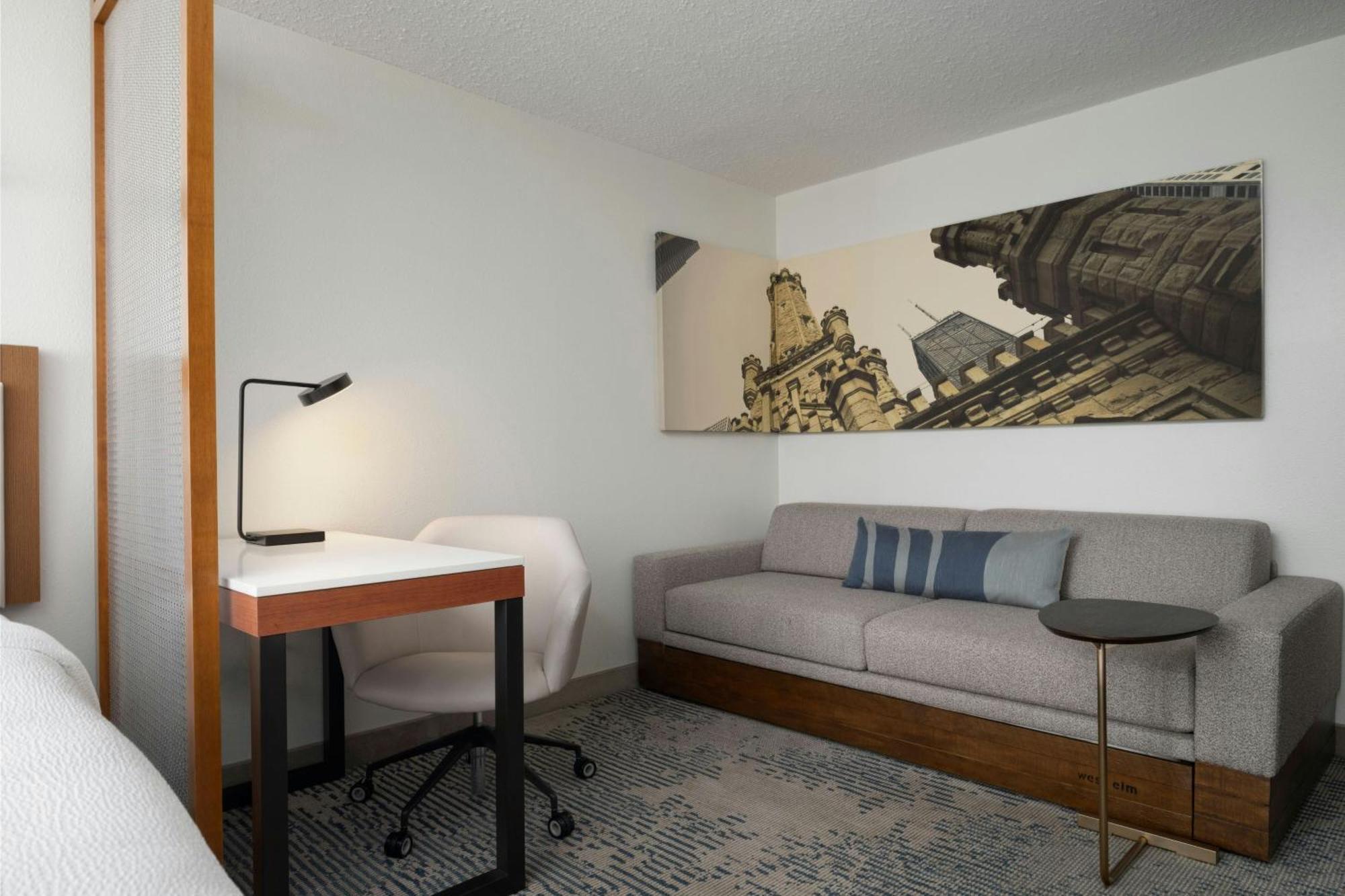 Corner Studio with Two Double Beds with Sofa Bed and City View